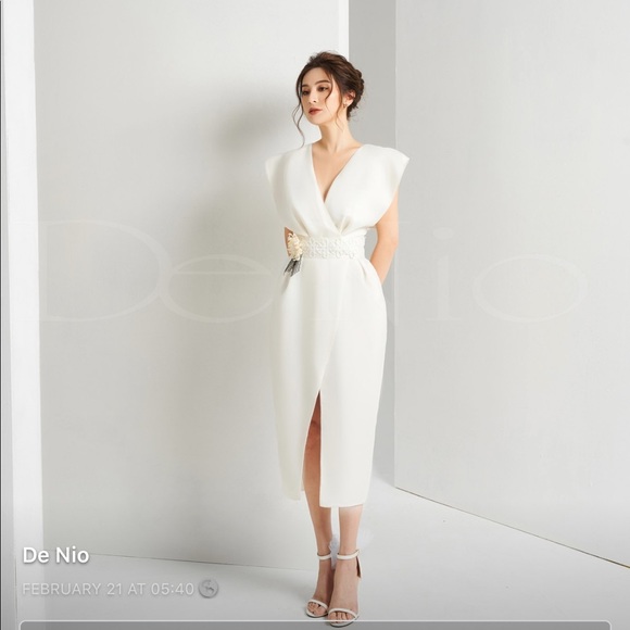 a brand new white dress. - Picture 1 of 2